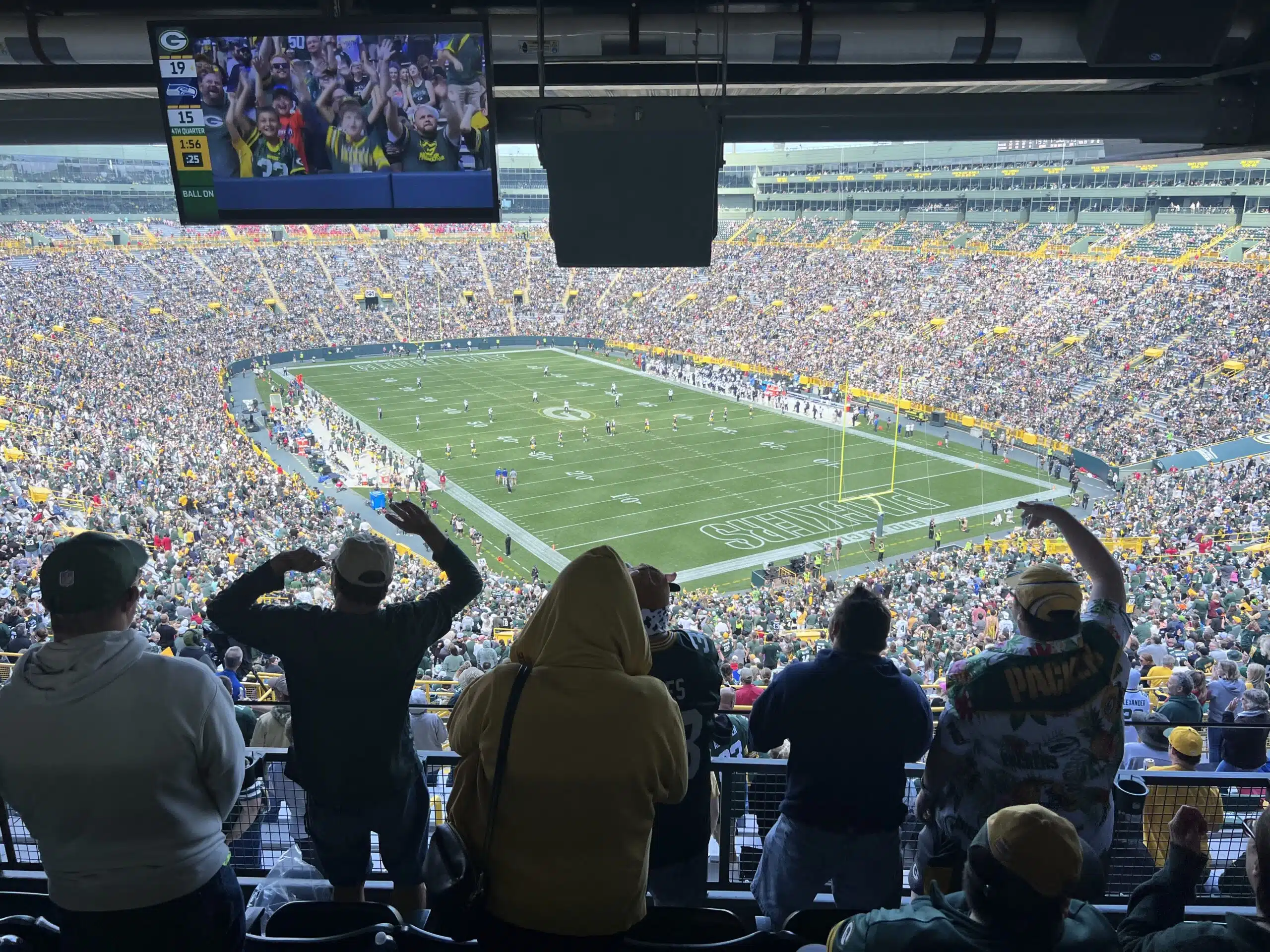 Campers cheer on the Packers at Lambeau field!